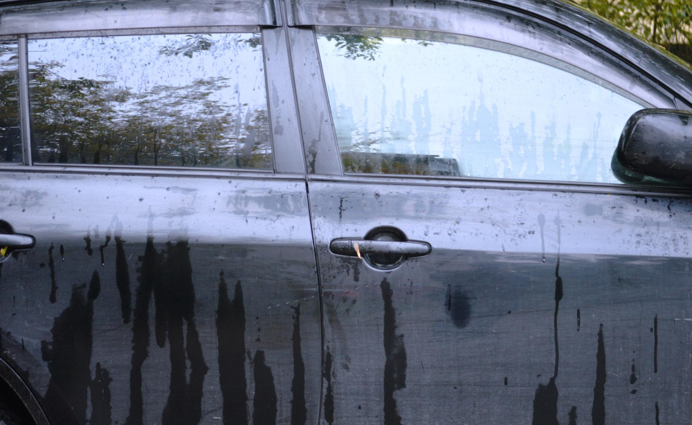 Dirty glass after a basic car wash