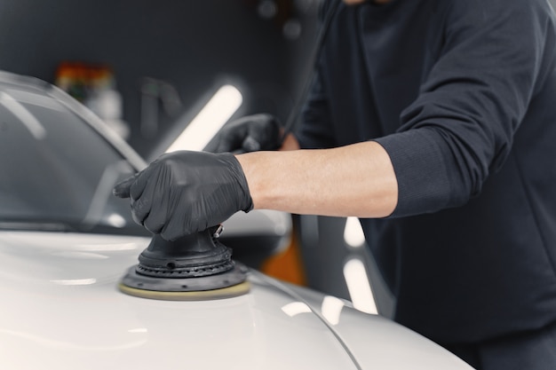 Machine polishing black car